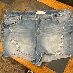 Torrid Jean shorts with rainbow pocket.Size 24